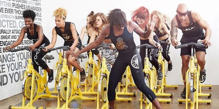 Image of women riding bikes at soulcycle