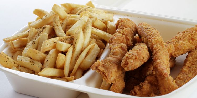 Photo of chicken wings with fries