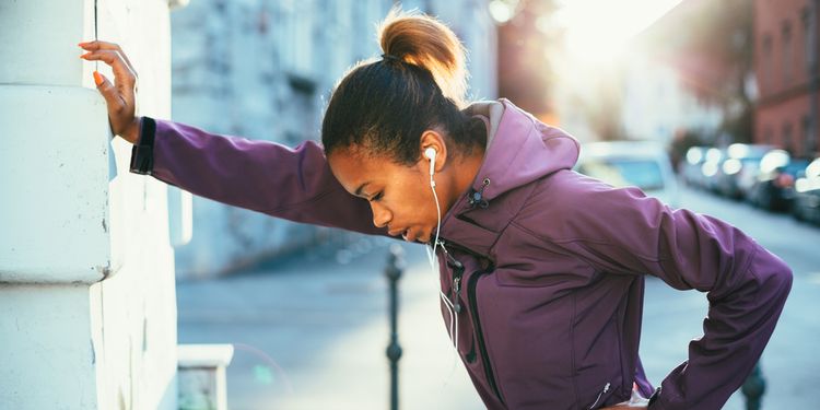 Photo of fatigued woman after jogging