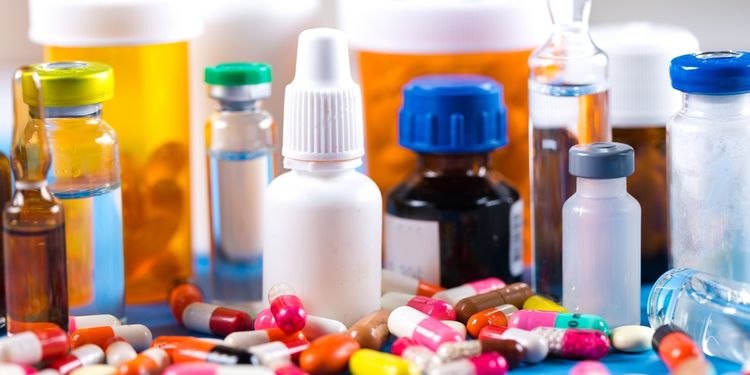 Photo of various pills and medications on table