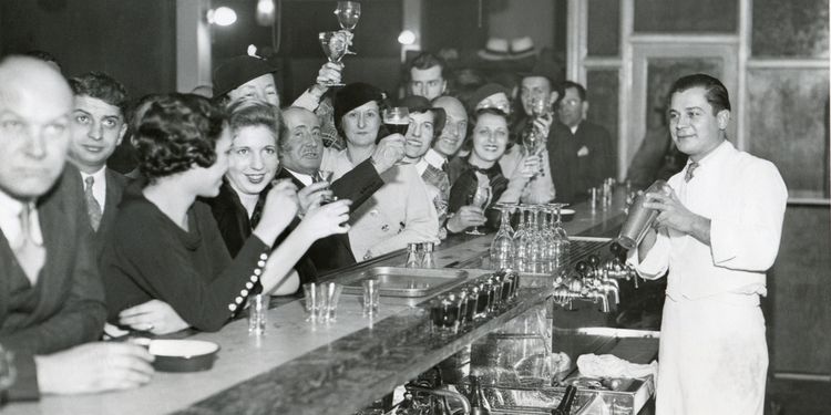 Photo of people drinking at a bar, Prohibition Ending in 1933