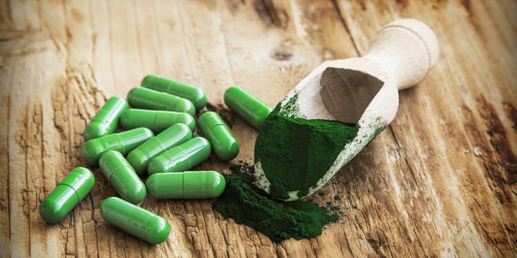 Photo of spirulina pills and powder